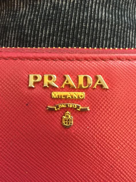 how to tell fake prada wallet|real prada purse.